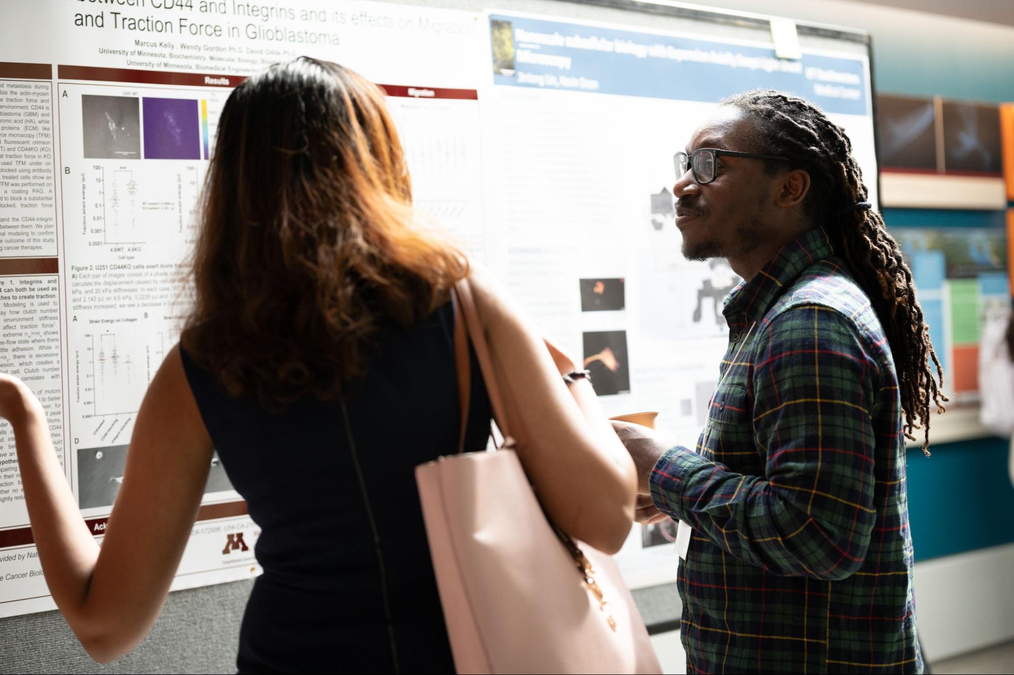 people at a poster session