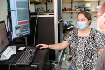 Woman using a computer in a lab